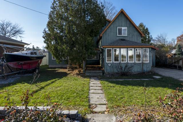 Front of house: Stone path across the front lawn to the porch