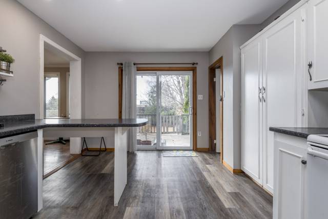 Kitchen: Pantry cupboards and deck access