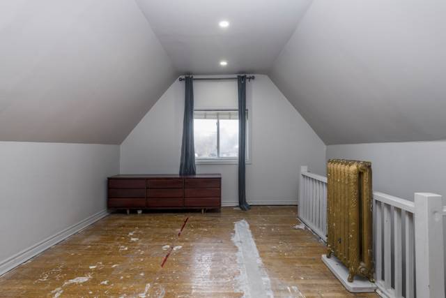 Bedroom 4: Long room under the eaves with pot lights